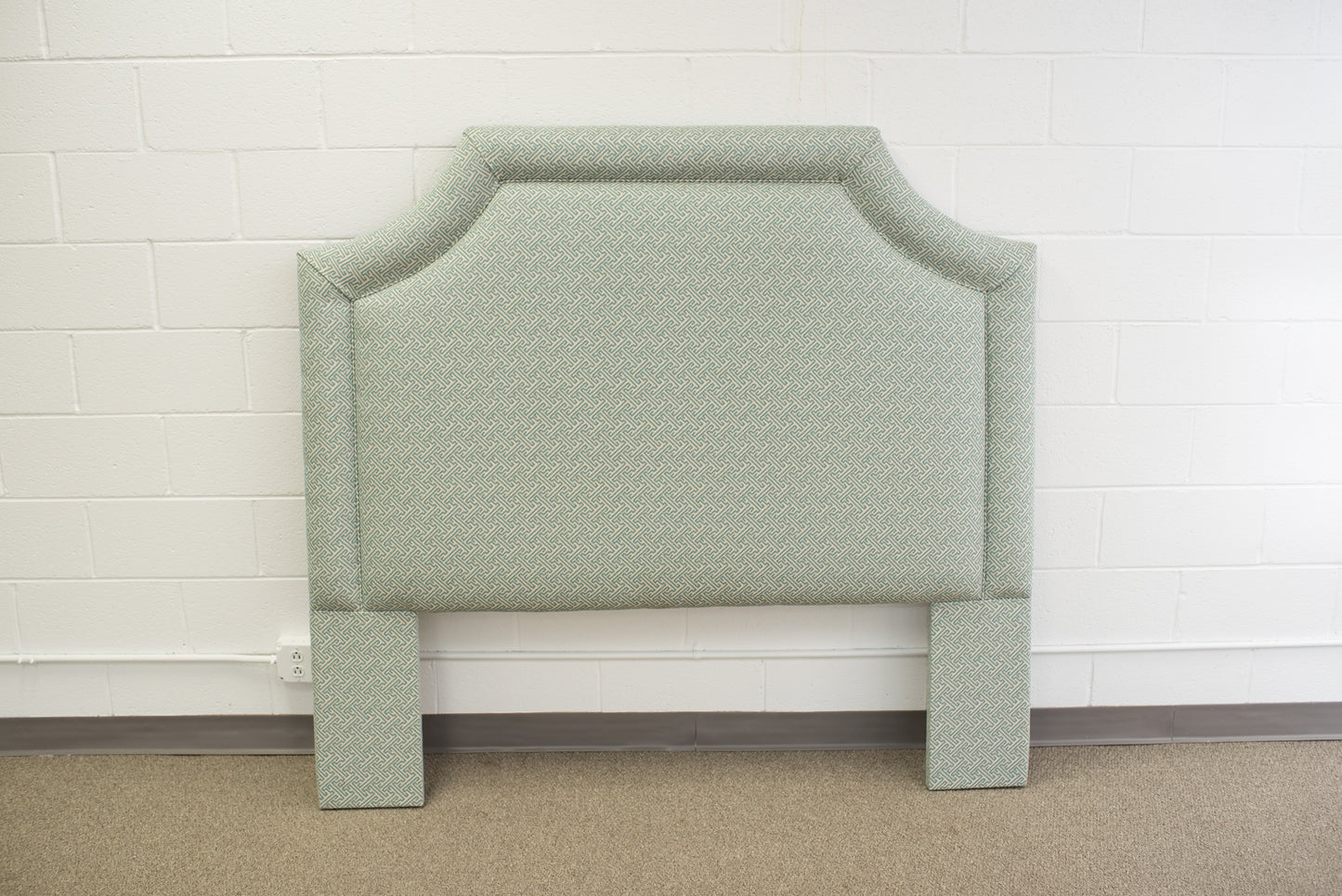Queen upholstered headboard in green and cream Kravet Fabric by Winston's Collection
