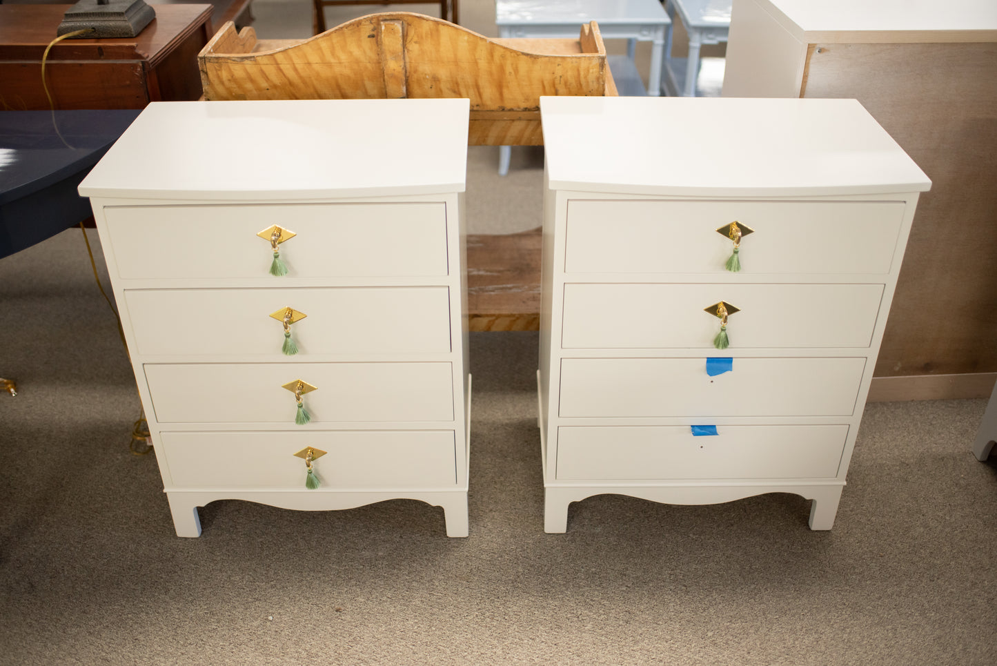 Pair of white dove nightstands with green tassel pulls