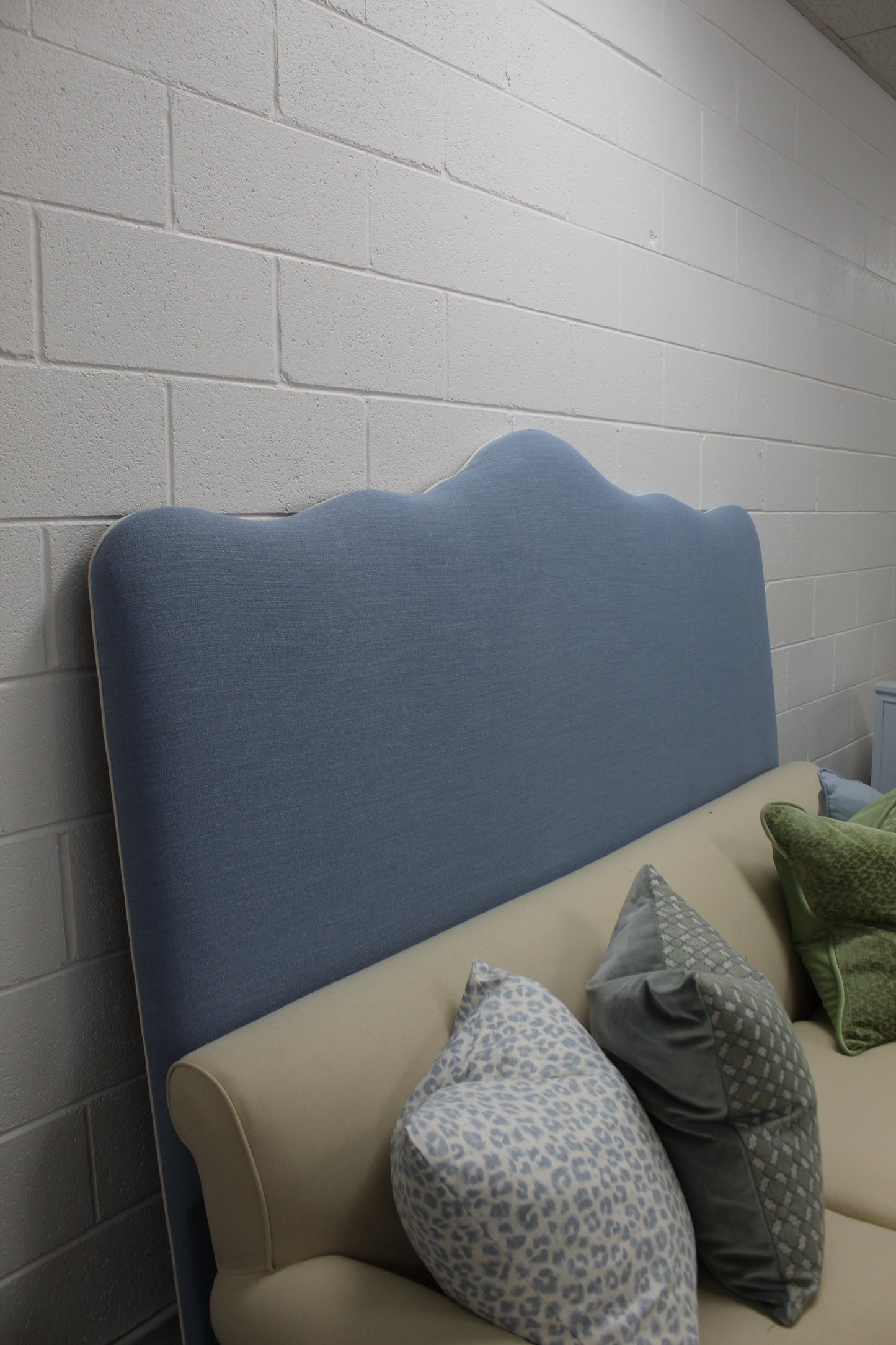 King upholstered blue headboard