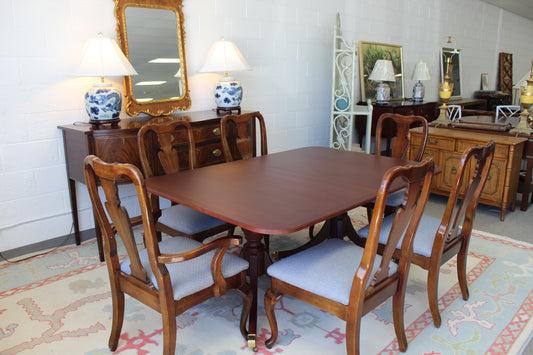 Dining table with 6 chairs (3 total leaves)