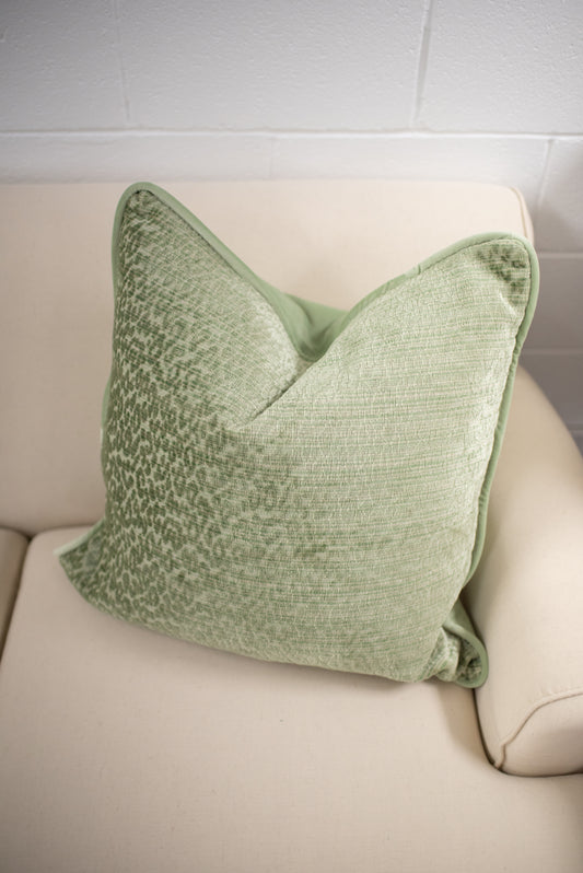 Green animal print cut velvet pillow