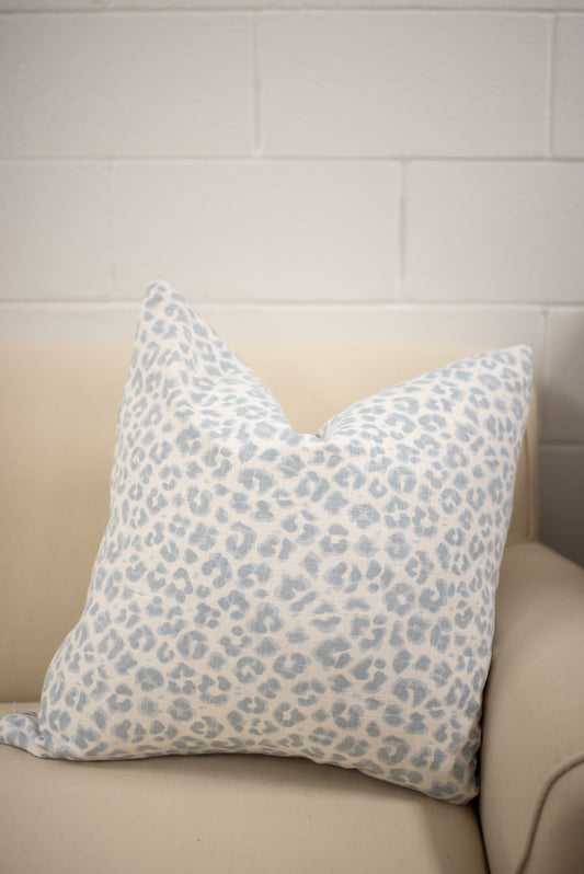 white and blue animal print leopard pillow